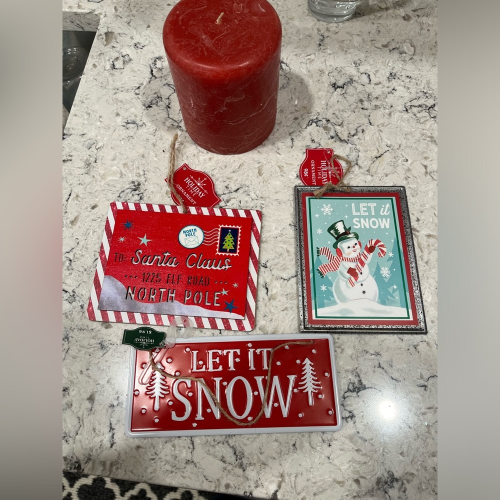 Christmas ornaments and candle